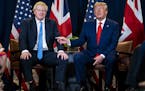 FILE -- Prime Minister Boris Johnson of Britain, left, meets with President Donald Trump during the United Nations General Assembly at U.N. headquarte