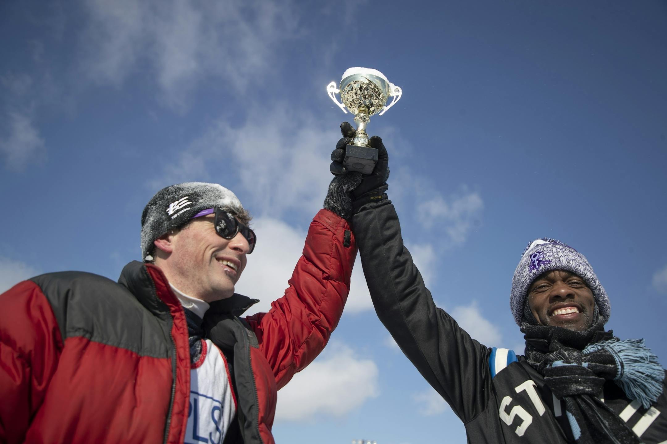 A snowball fight was held at McMurray Fields between the cities of St. Paul and Minneapolis, Mayor Jacob Frey left, and St. Paul Mayor Melvin Carter celebrated in a tie between the two cites during a snowball fihgt Sunday February 24, 2019 in St. Paul, MN.
