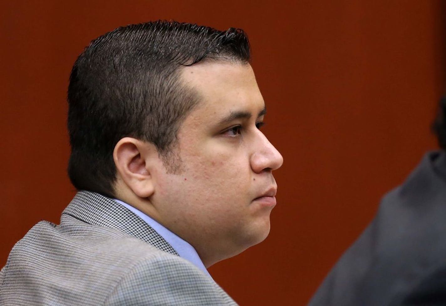 George Zimmerman listens to a prospective juror answers questions in Seminole circuit court on the sixth day of his trial, in Sanford, Florida, Monday, June 17, 2013. Zimmerman is accused in the fatal shooting of Trayvon Martin.