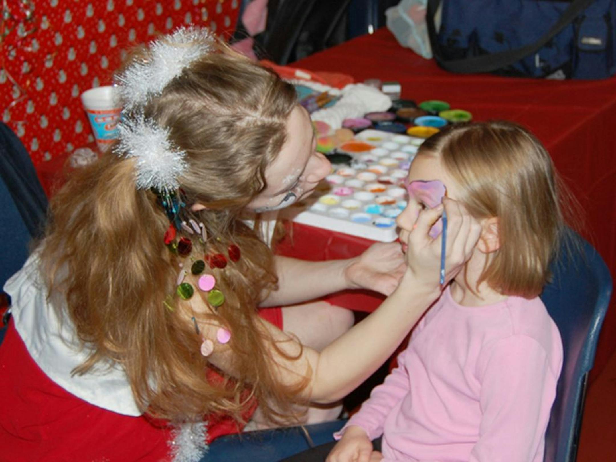 The face painting photo is courtesy of city of Inver Grove Heights.