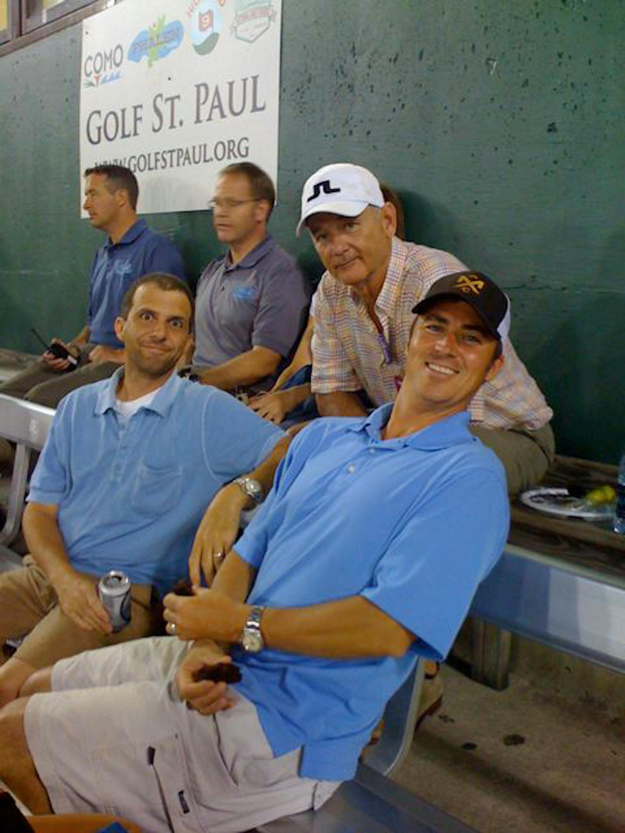 Bill Murray hung out with some of the MAC Daddies at a Saints game. This picture was taken before Murray and one MAC Daddy switched caps.