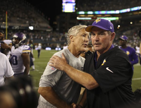 Vikings head coach Mike Zimmer and Seattle Seahawks head coach Pete Carroll exchanged brief pleasantries after the game Thursday night.