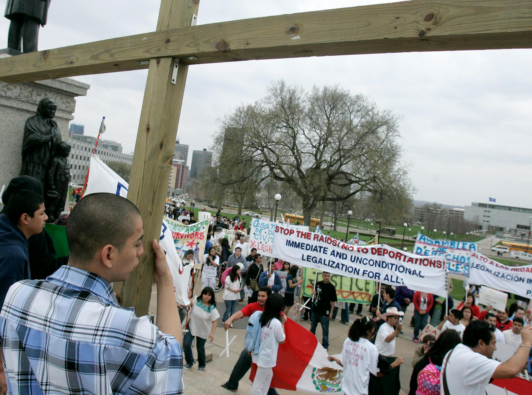 Hundreds of demonstrators took part in an immigrant rights rally at the State Capitol following a march from downtown St. Paul May 1.