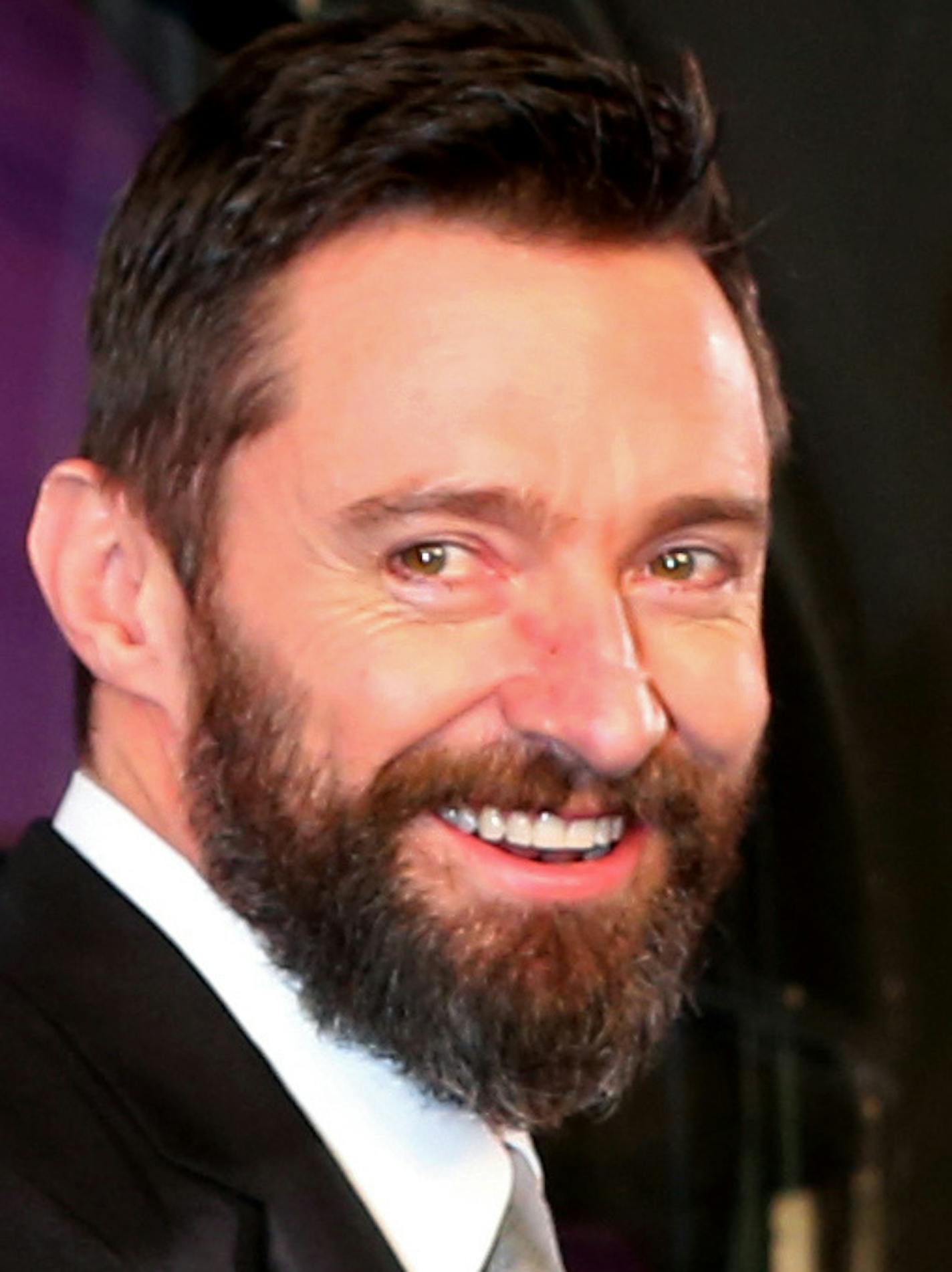 Australian actor Hugh Jackman who plays Wolverine gestures during an event for the Japan Premiere of X-Men Days Of Future Past in Tokyo, Tuesday, May 27, 2014. (AP Photo/Eugene Hoshiko)