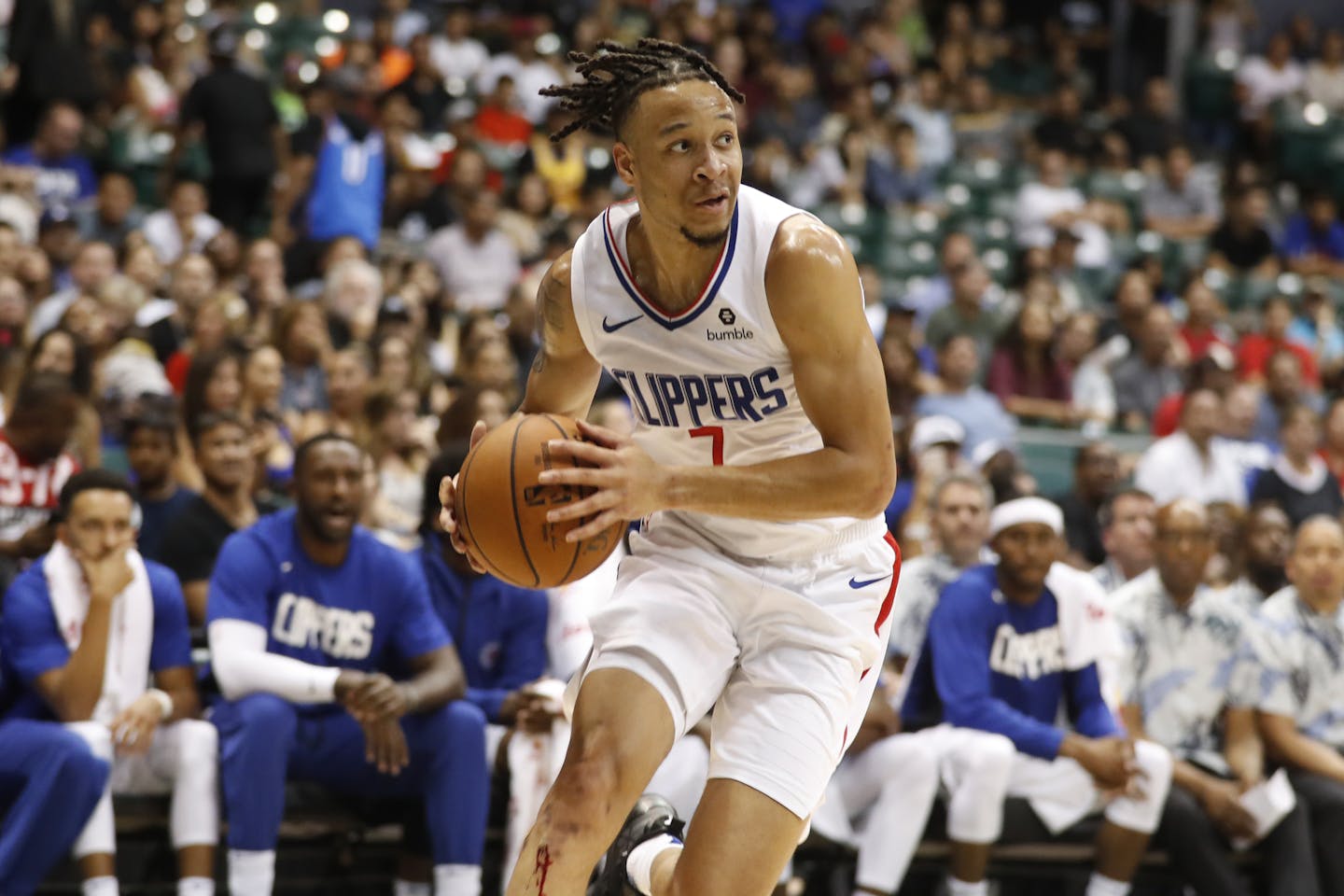 Los Angeles Clippers shooting guard Amir Coffey (7) in action against the Houston Rockets during an NBA preseason basketball game, Thursday, Oct 3, 2019, in Honolulu. (AP Photo/Marco Garcia) ORG XMIT: himg229