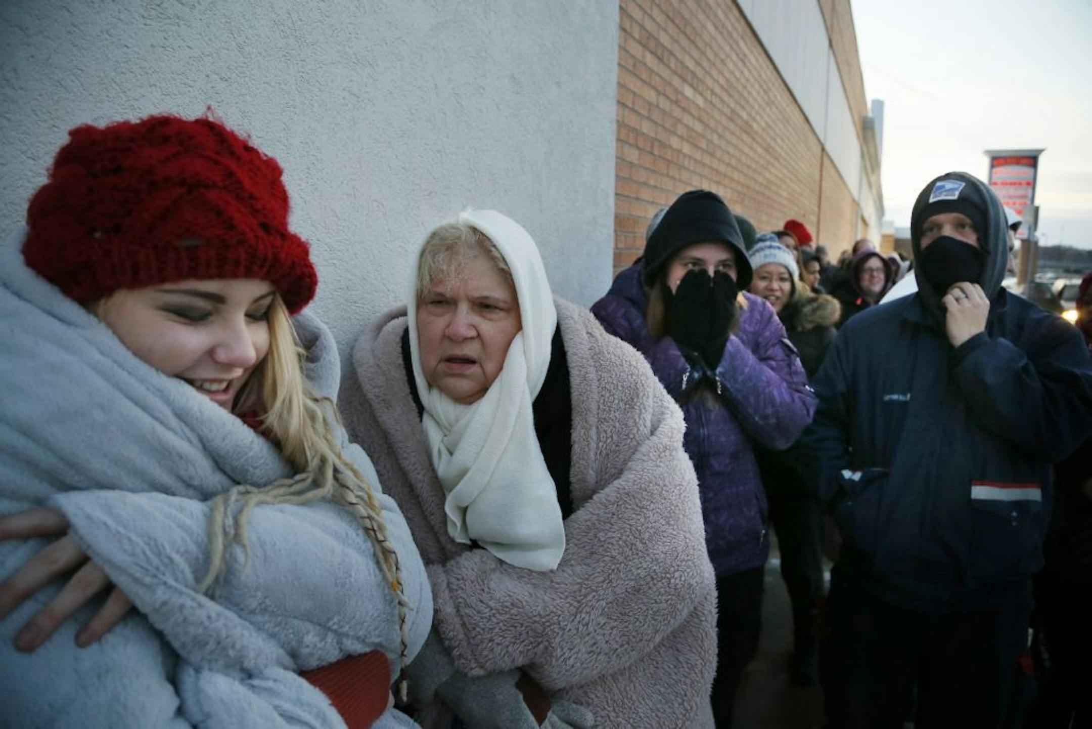 Alex Anderson of Lonsdale and her grandmother Jeannette Anderson waited in the cold for Toys R Us to open Thursday November 27, 2014 in Bloomington, MN.