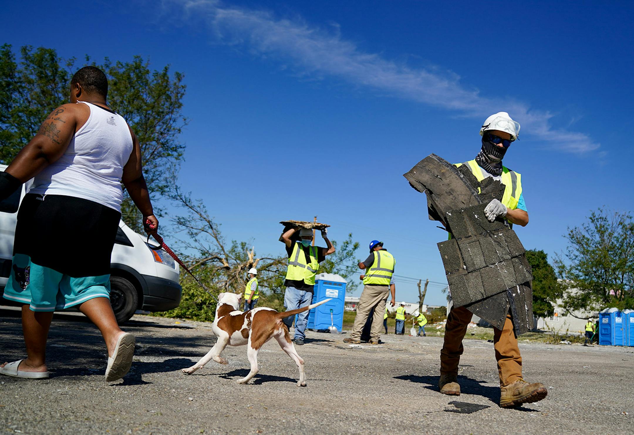 Neighbors, volunteers and contract workers from Blue Sky Restoration cleaned up debris from Monday's derecho that ripped through Cedar Rapids. Derecho storm devastation in Cedar Rapids Iowa, with 130,000 residents the state's second-largest city. The "inland hurricane" last week wiped out half the city's tree canopy and a week later, thousands are still homeless and without power.