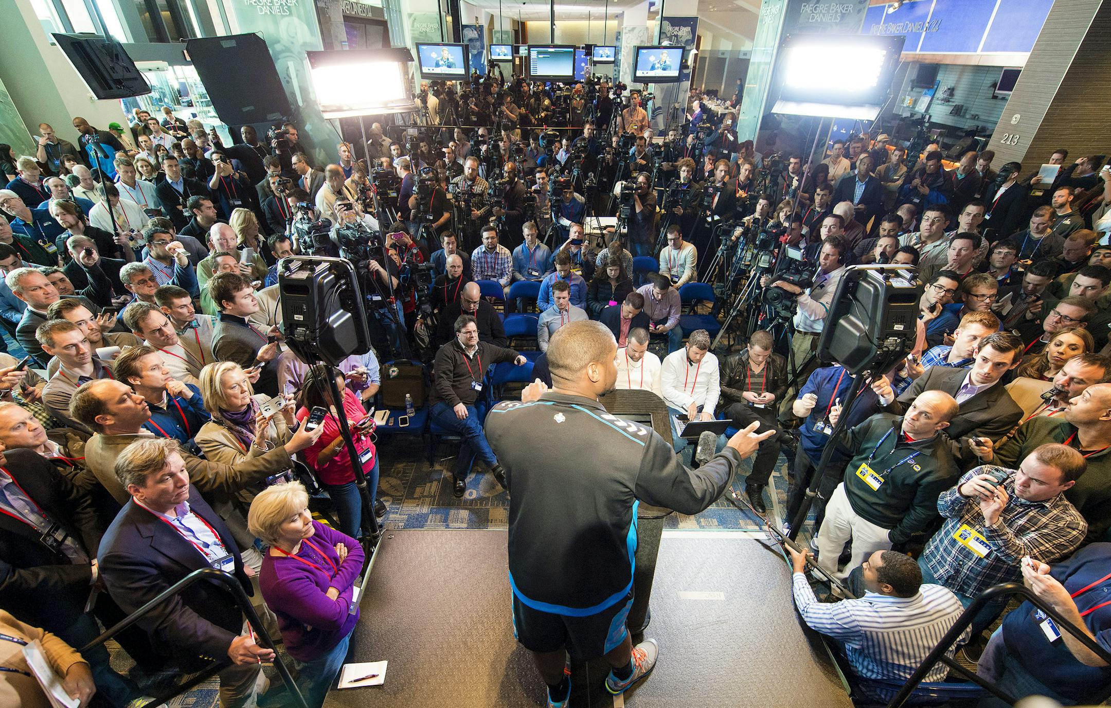 Michael Sam, a star player at University of Missouri, during a news conference at the NFL Scouting Combine at the Lucas Oil Stadium in Indianapolis, Feb. 22, 2014. Sam, Richard Sherman and Jonathan Martin are young African-American football players who represent three explosive elements in American culture -- race, class and sexual orientation -- depicting new types of athletes who break the mold of the typical NFL player. (Andrew Hancock/The New York Times)