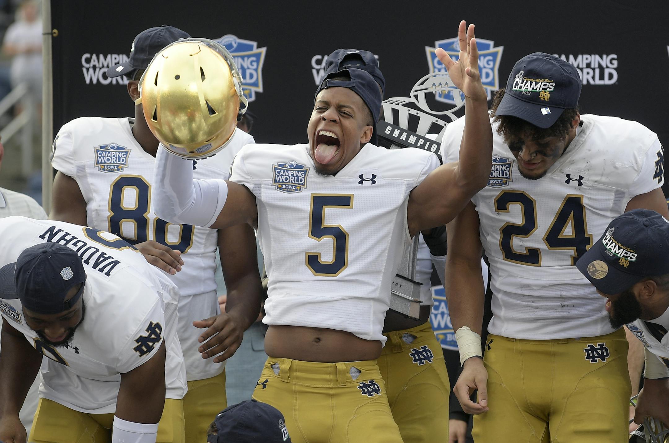 Notre Dame cornerback Troy Pride Jr. (5) celebrates after getting a win over Iowa State in the Camping World Bowl NCAA college football game Saturday, Dec. 28, 2019, in Orlando, Fla. (AP Photo/Phelan M. Ebenhack)