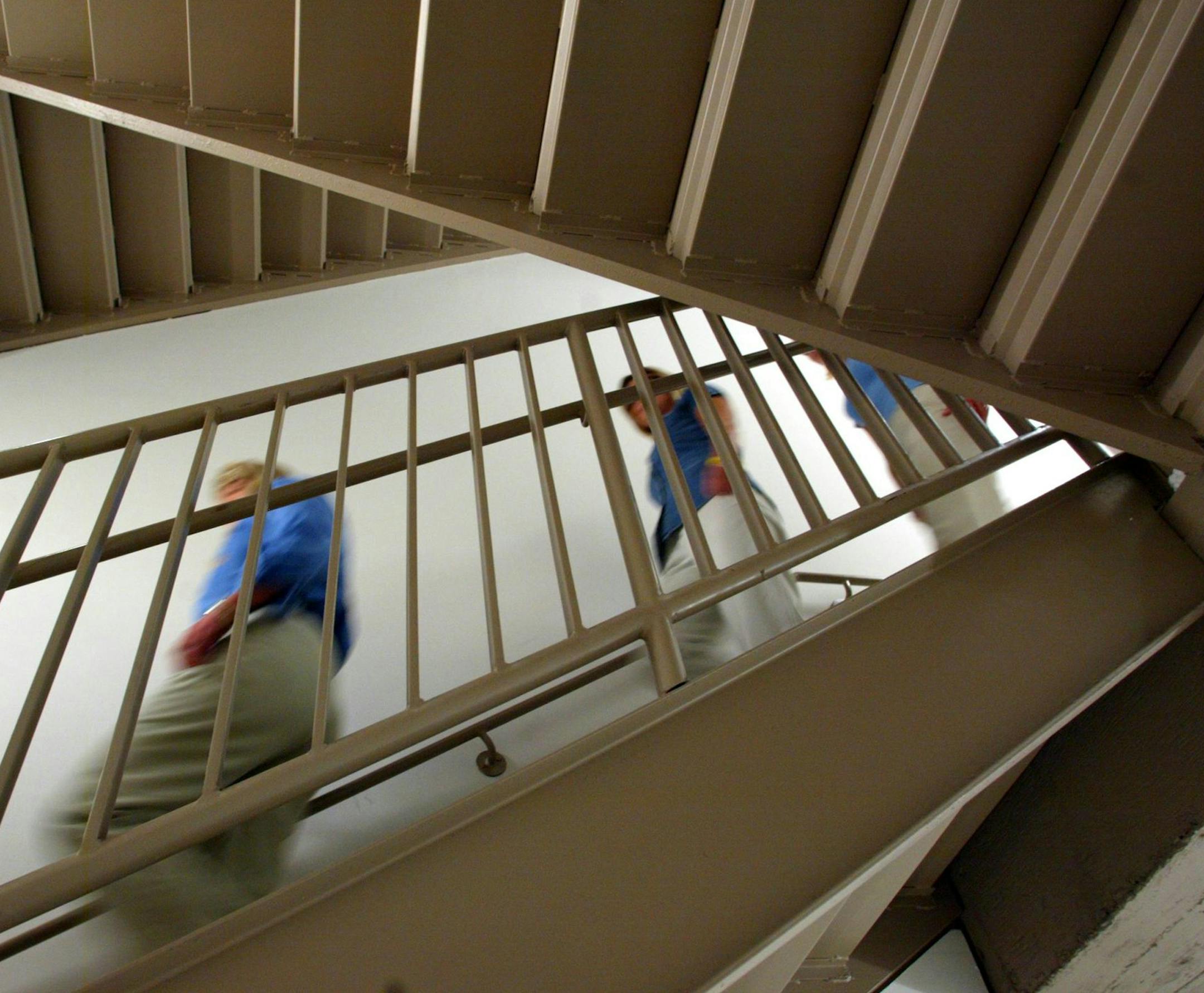 -- NO MAGS, NO SALES -- KRT LIFESTYLE STORY SLUGGED: HEALTH-WORKFIT KRT PHOTO BY ARIANE KADOCH SWISA/DALLAS MORNING NEWS (September 17) SBC employees, from left, Ronda Vittes, Connie Grimes, Terri Orms and Alexandra Cogburn climb nine flights of stairs for excercise at least twice a day to get their exercise in at work. They are shown August 26, 2004, in Richardson, Texas. (gsb) 2004