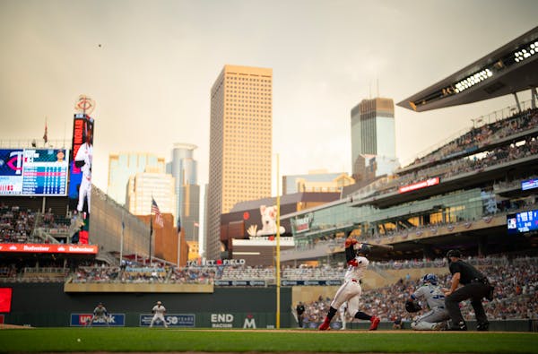 Byron Buxton of the Twins hit a sacrifice fly during a June 3 game at Target Field.