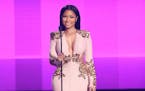 Nicki Minaj presents the award presents the award for favorite duo or group - pop/rock at the American Music Awards at the Microsoft Theater on Sunday