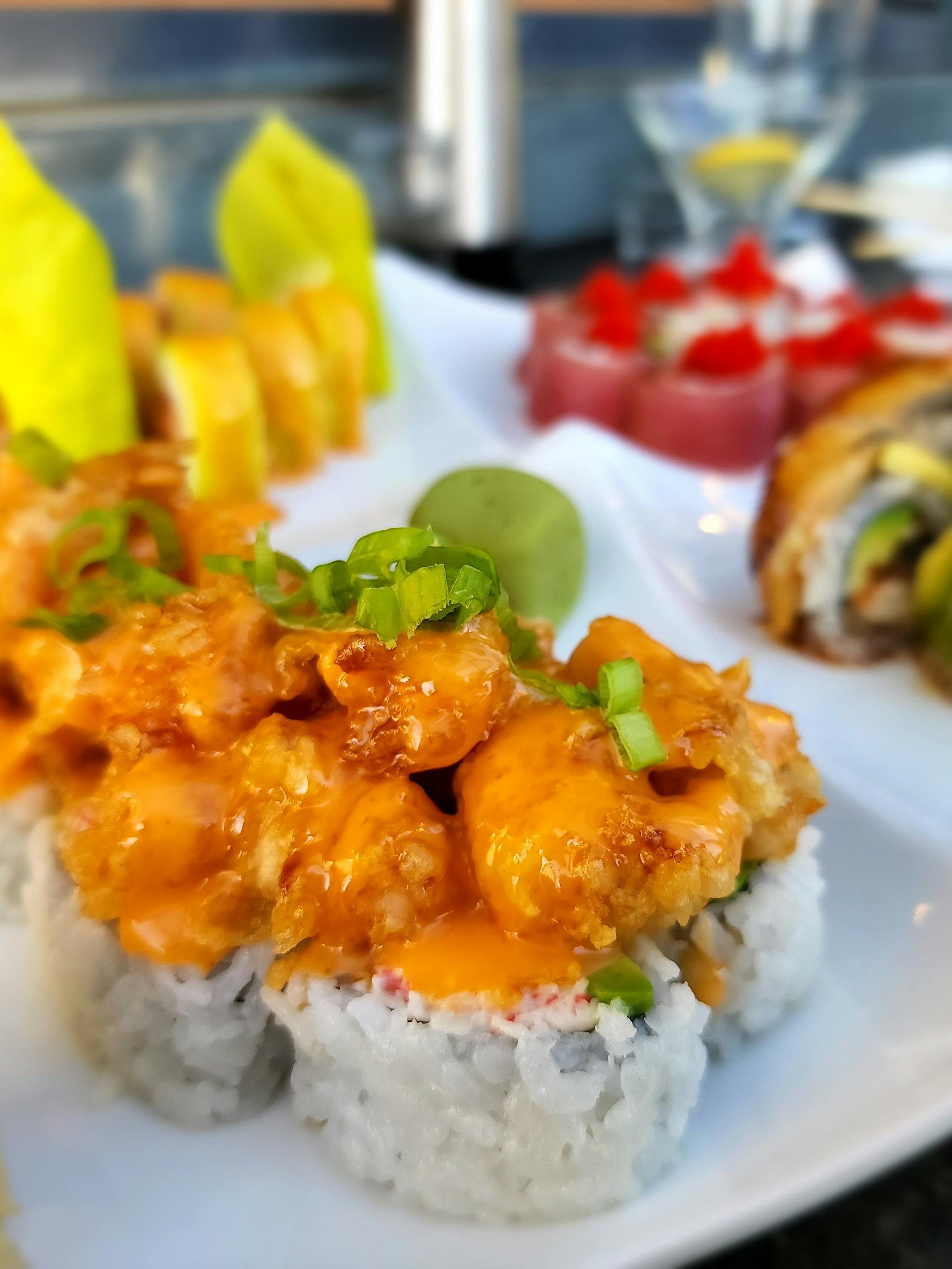 Deep-fried shrimp top a California roll at Kazoku in Minnetonka