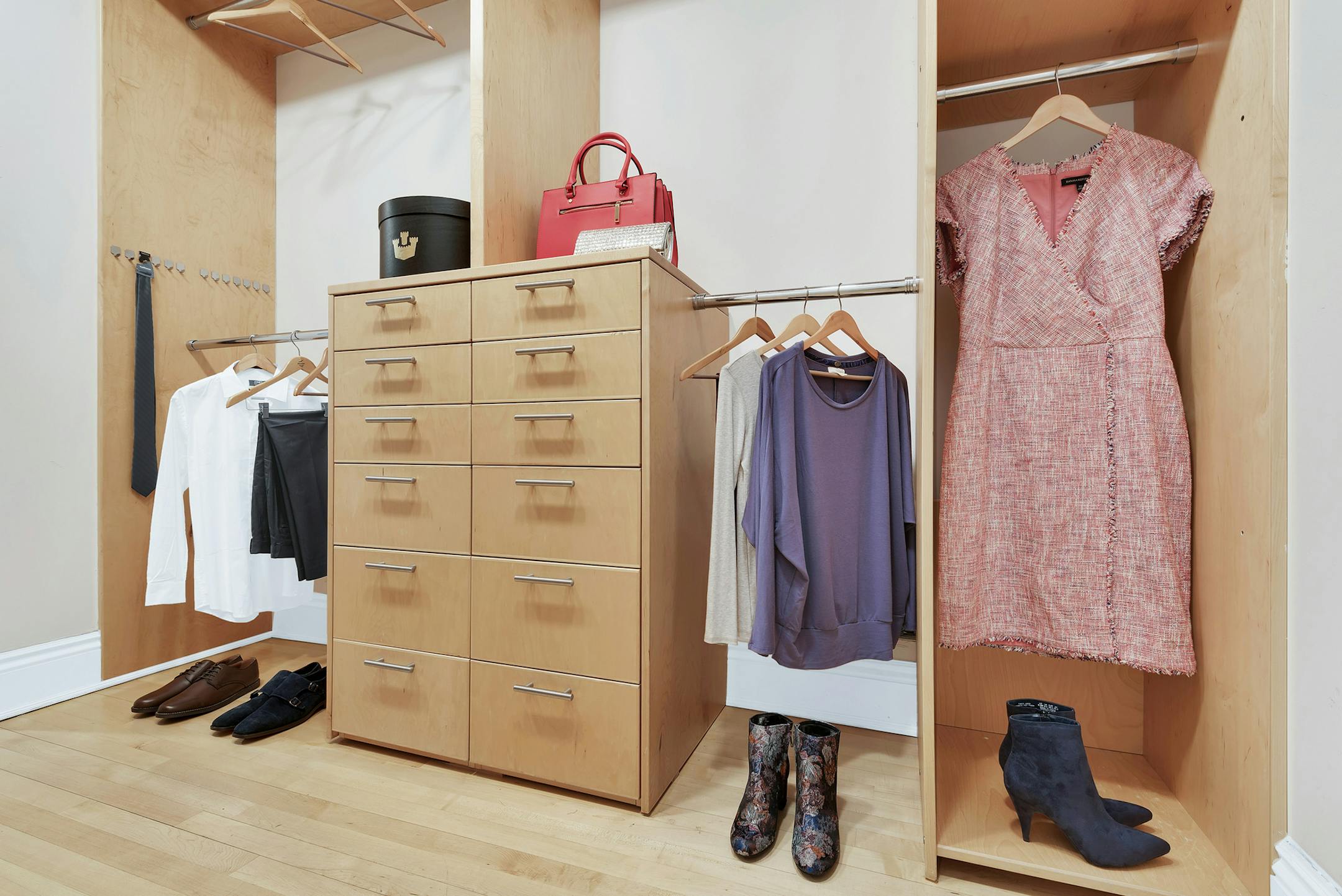 The existence of both short and long hang rods as well as drawers helps maximize this closet's functionality. (Design Recipes) ORG XMIT: 1242010