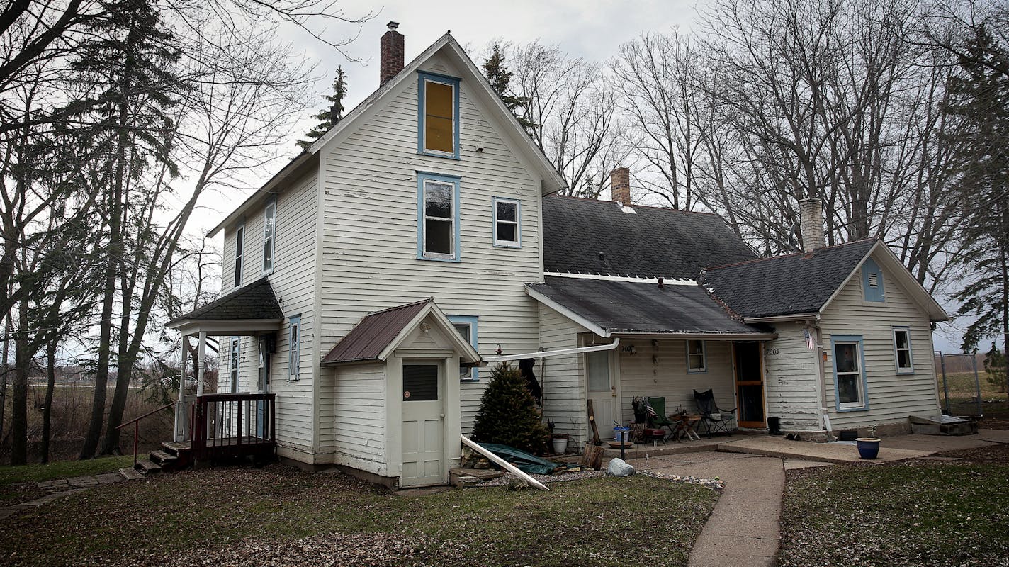 The Hill-Gibson House, built in 1850, stands at the center of a controversy in the City of Cottage Grove. City officials want to build senior living apartments on the site, but since historic properties can&#xed;t be moved or demolished, its owner, now a bank must first delist it. ] JIM GEHRZ &#xef; james.gehrz@startribune.com /Cottage Grove, MN / March 31, 2016 4:30 PM - BACKGROUND INFORMATION: A battle is brewing over a recent Cottage Grove City Council decision giving itself the power to remo