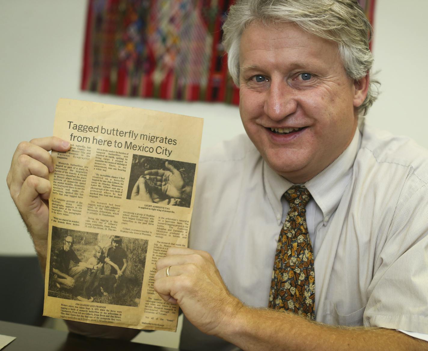 When James Street was a little boy he helped tag butterflies with his science teacher in 1975 as part of a project to track their migration. The project led to the discovery of the blutterflies' undiscovered wintering grounds in Mexico. Now a movie is debuting at the Science Museum that tells the story of the project. He was photographed holding a newspaper article featuring his discovery on Friday, September 26, 2014 in St. Paul, Minn. ] RENEE JONES SCHNEIDER &#x201a;&#xc4;&#xa2; reneejones@sta