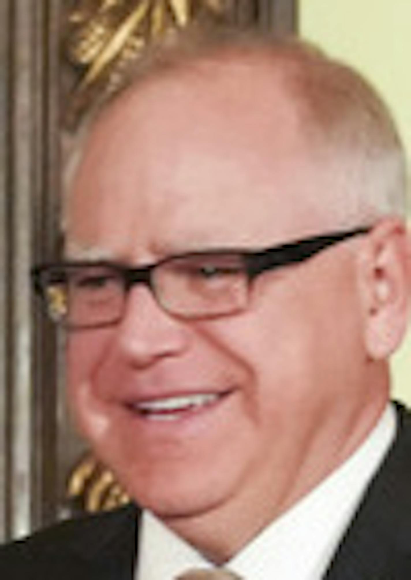 Gov. Tim Walz, from left, House Speaker Melissa Hortman and Senate Majority Leader Paul Gazelka hold a news conference to announce a budget deal in St. Paul, Minn., Sunday, May 19, 2019. Walz and top legislative leaders reached a bipartisan budget deal Sunday in which the governor dropped his proposed gas tax increase but got to keep most of an expiring tax that helps fund health care programs, Republicans got an income tax cut for middle-class Minnesotans and both sides claimed credit for addit