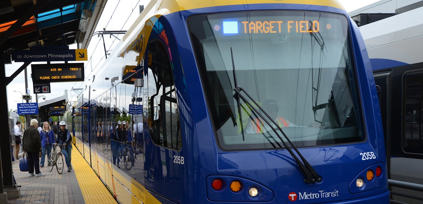 The Hiawatha Light Rail Line is being rebranded as the METRO Blue Line. The Blue Line is the first of the Twin Cities METRO system of rapid transit lines which include METRO Red Line Bus Rapid Transit on Cedar Ave. METRO Blue Line trains will now have three cars and will run every ten minutes throughout most of the day. Twelve new light-rail vehicles dedicated to the line will allow this increased service capacity. During the kickoff event Metro Transit staff handed out Blue line pens, new sched