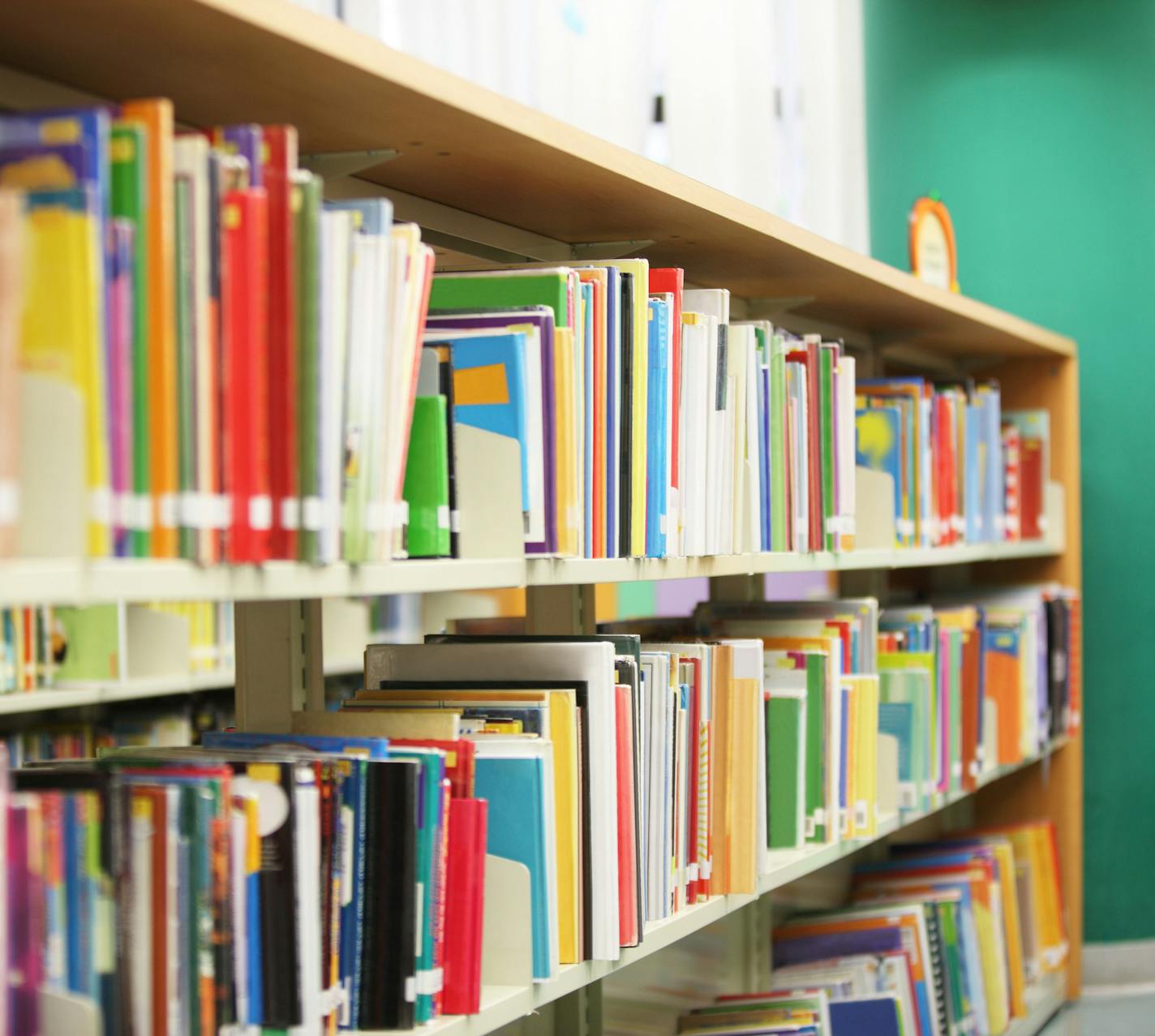 Colorful books on the bookshelf in library. istock