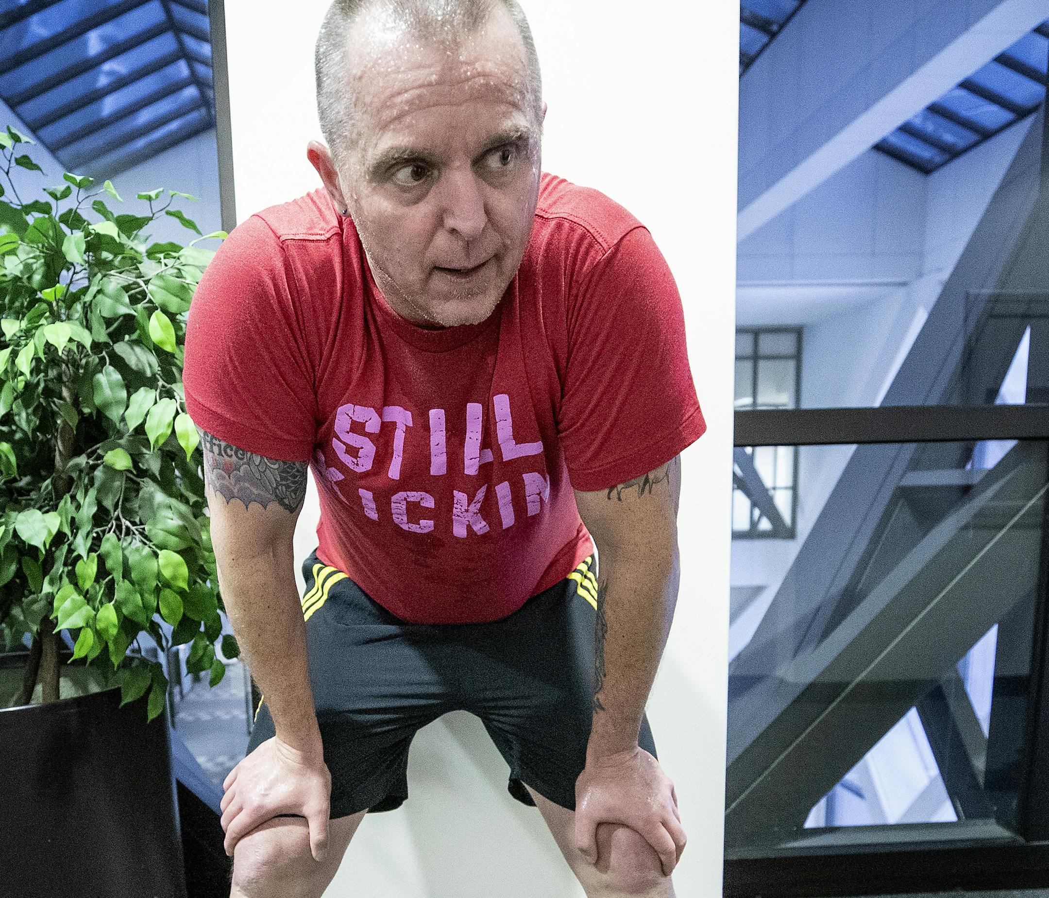Minneapolis fire department captain Jeremy Norton caught his breath between rounds of climbing stairs during a training session at the Hennepin County Government Center.