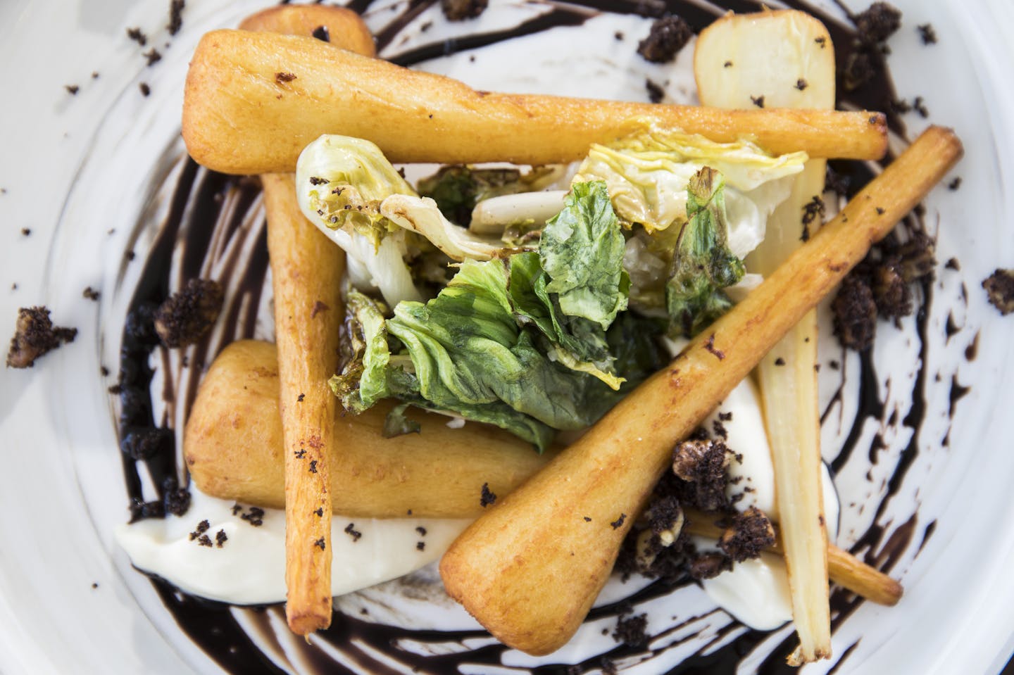 Parsnip with coffee, caramelized goats milk and escarole. ] LEILA NAVIDI &#xef; leila.navidi@startribune.com BACKGROUND INFORMATION: Esker Grove, the Walker Art Center's new restaurant, photographed in Minneapolis on Friday, March 3, 2017.