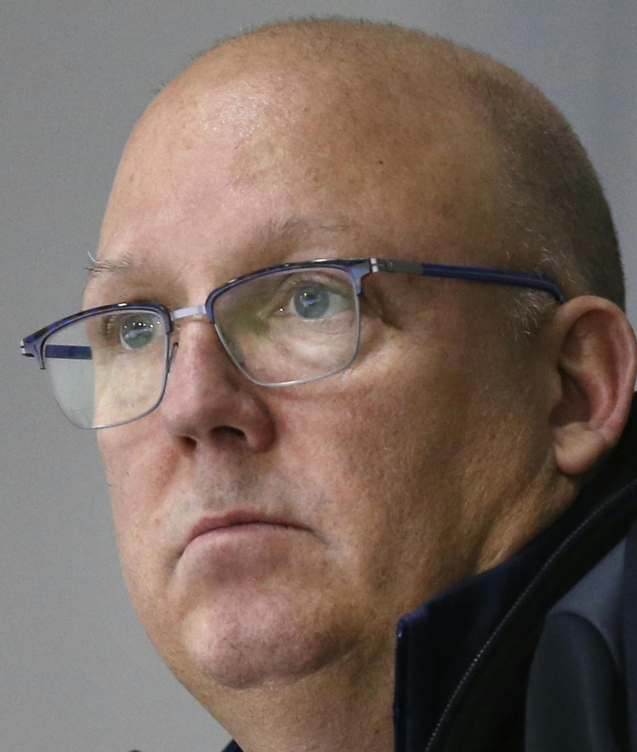 In this Sunday, Dec. 17, 2017 photo, United States' under-20 hockey coach Bob Motzko watches his team scrimmage during hockey practice in Columbus, Ohio. Expectations will be high when the US team defends its title on home soil at the World Junior tournament, starting the day after Christmas in Buffalo, N.Y. (AP Photo/Jay LaPrete) ORG XMIT: MIN2017122602013831