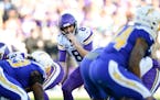 Minnesota Vikings quarterback Kirk Cousins in action during the second half of an NFL football game against the Los Angeles Chargers in Carson, Calif.