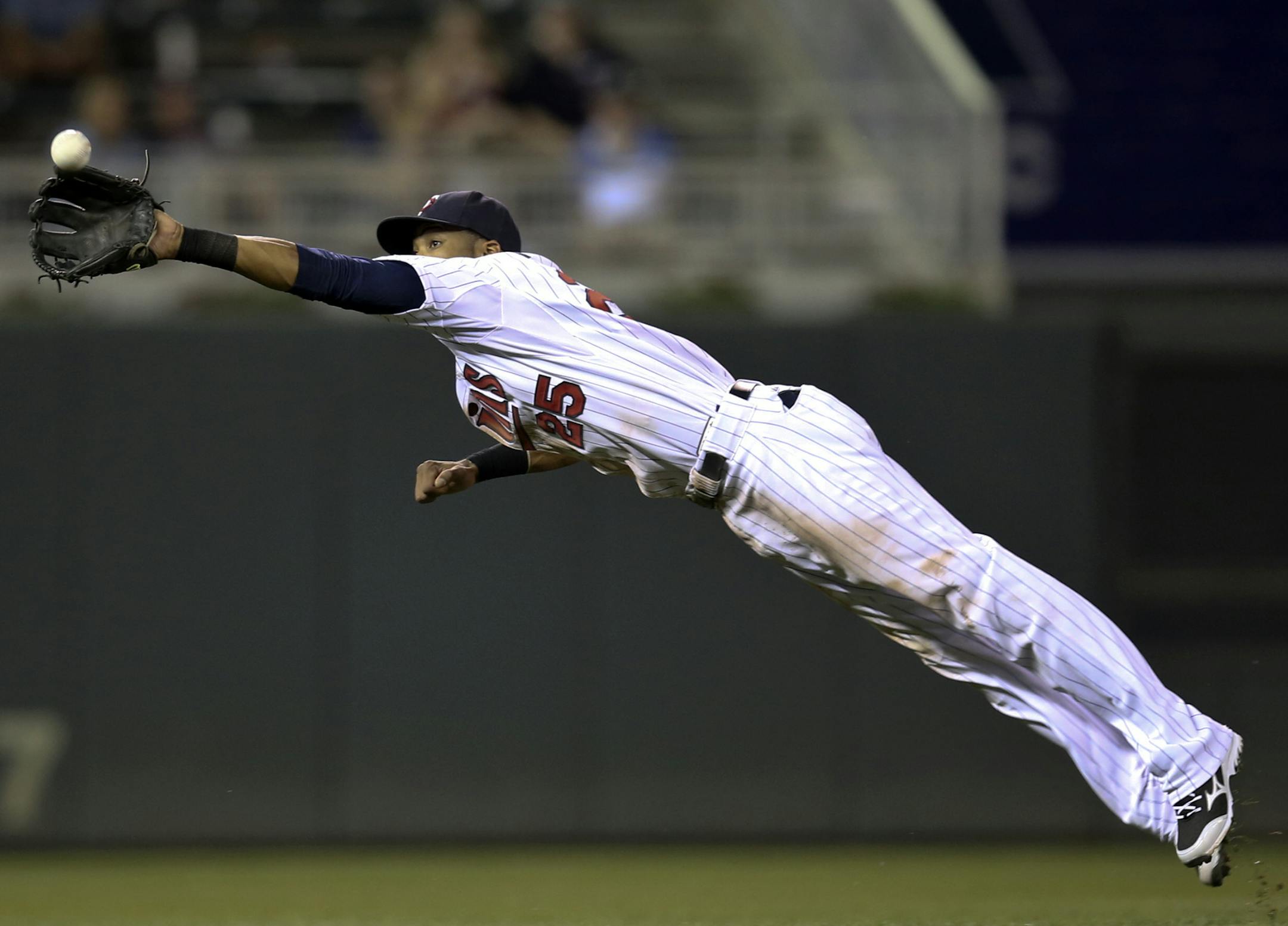 The Twins Pedro Florimon made a diving catch on a 9th inning line drive by Cleveland's Michael Brantley at Target Field during the Twins 3-2 win over Cleveland Friday, July 19, 2013, in Minneapolis, MN.](DAVID JOLES/STARTRIBUNE) djoles@startribune.com The Cleveland Indians and the Minnesota Twins at Target Field Friday, July 19, 2013, in Minneapolis, MN.
