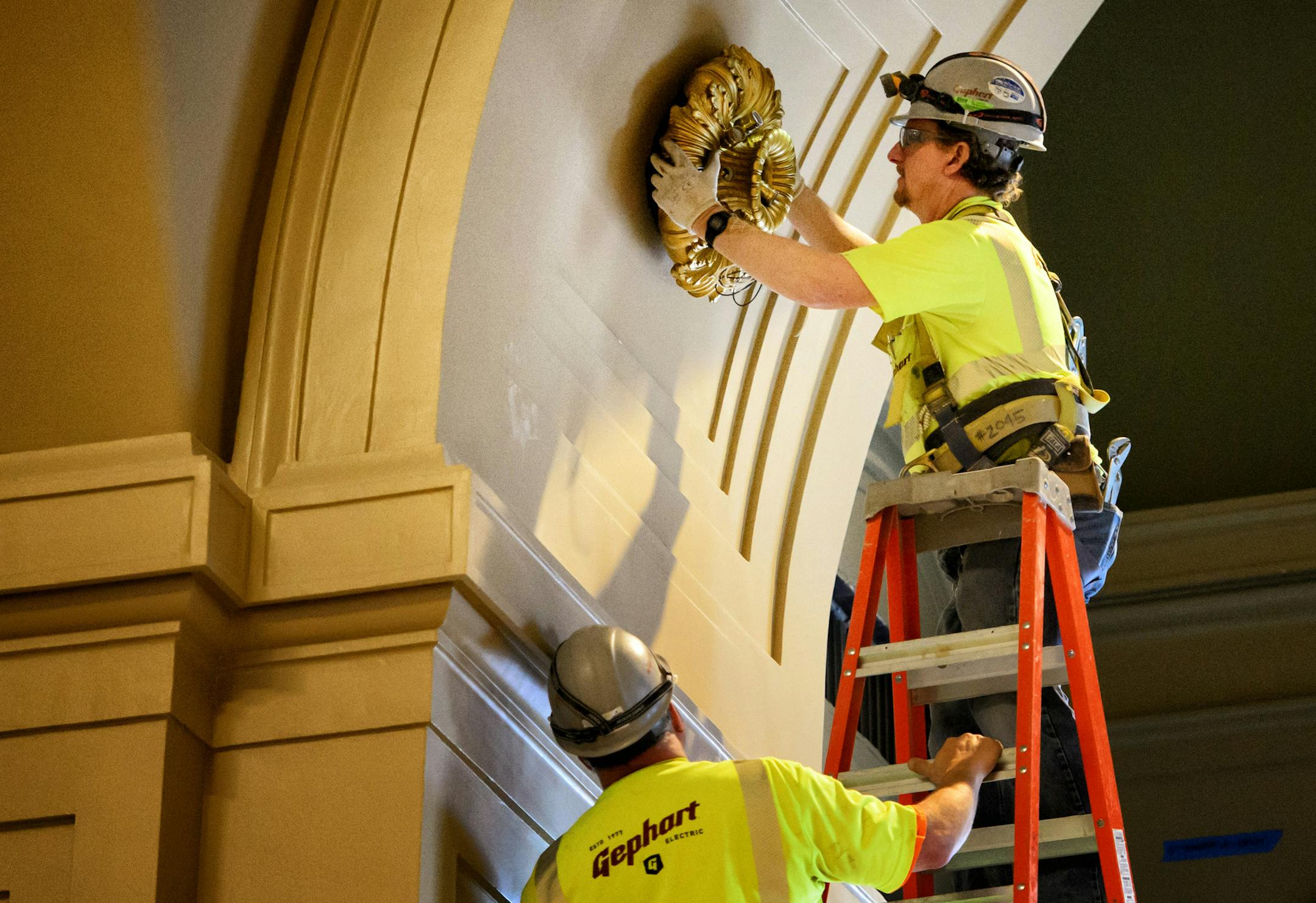 A historic lighting fixture is placed in the House Chamber with less than a week before the start of the session. ] GLEN STUBBE * gstubbe@startribune.com Thursday, March 3, 2016 With less than a week left before the beginning of the session, Tour of ongoing renovation work at the Minnesota State Capitol and at the House chamber currently being prepared for the legislative session.