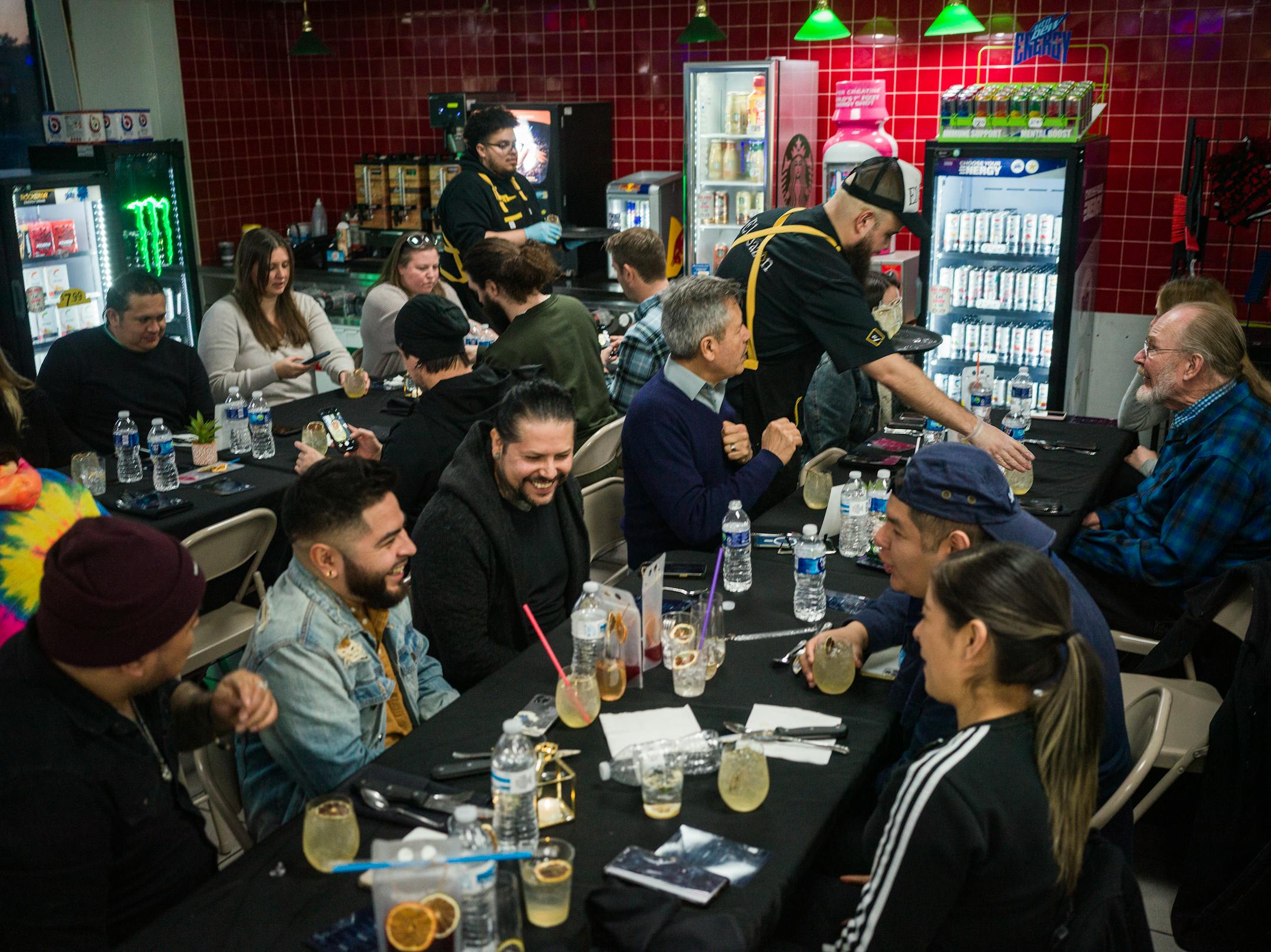 Guests enjoy the festive ambience inside the gas station.