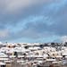 Snow covered rooftops, in Gateshead, England, Thursday, Nov. 25, 2010. Britain shivered in sub-zero temperatures on Thursday as snow fell unseasonably