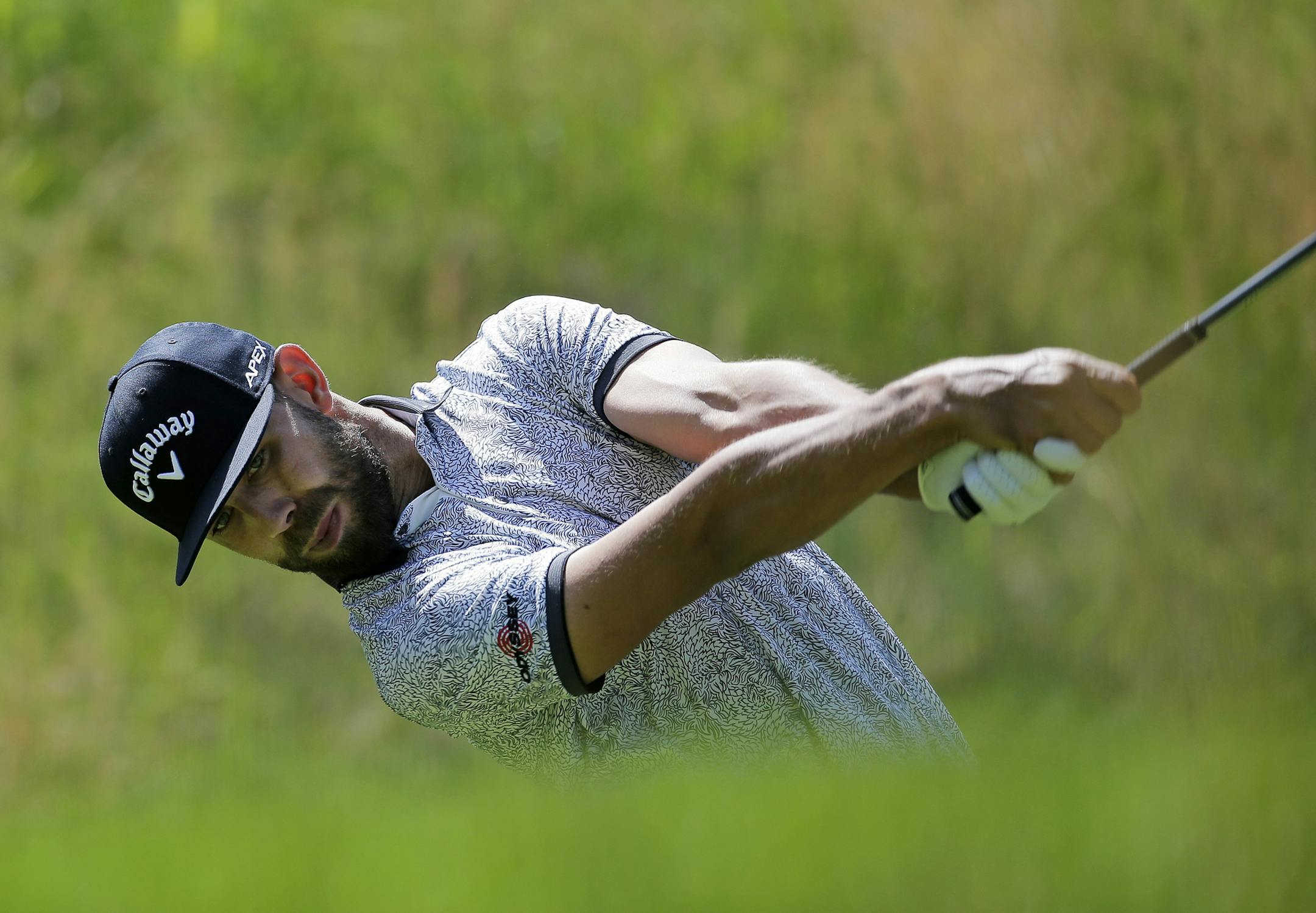 Erik Van Rooyen, of South Africa drives off the fourth tee during the third round of the PGA Championship golf tournament, Saturday, May 18, 2019, at Bethpage Black in Farmingdale, N.Y. (AP Photo/Seth Wenig)