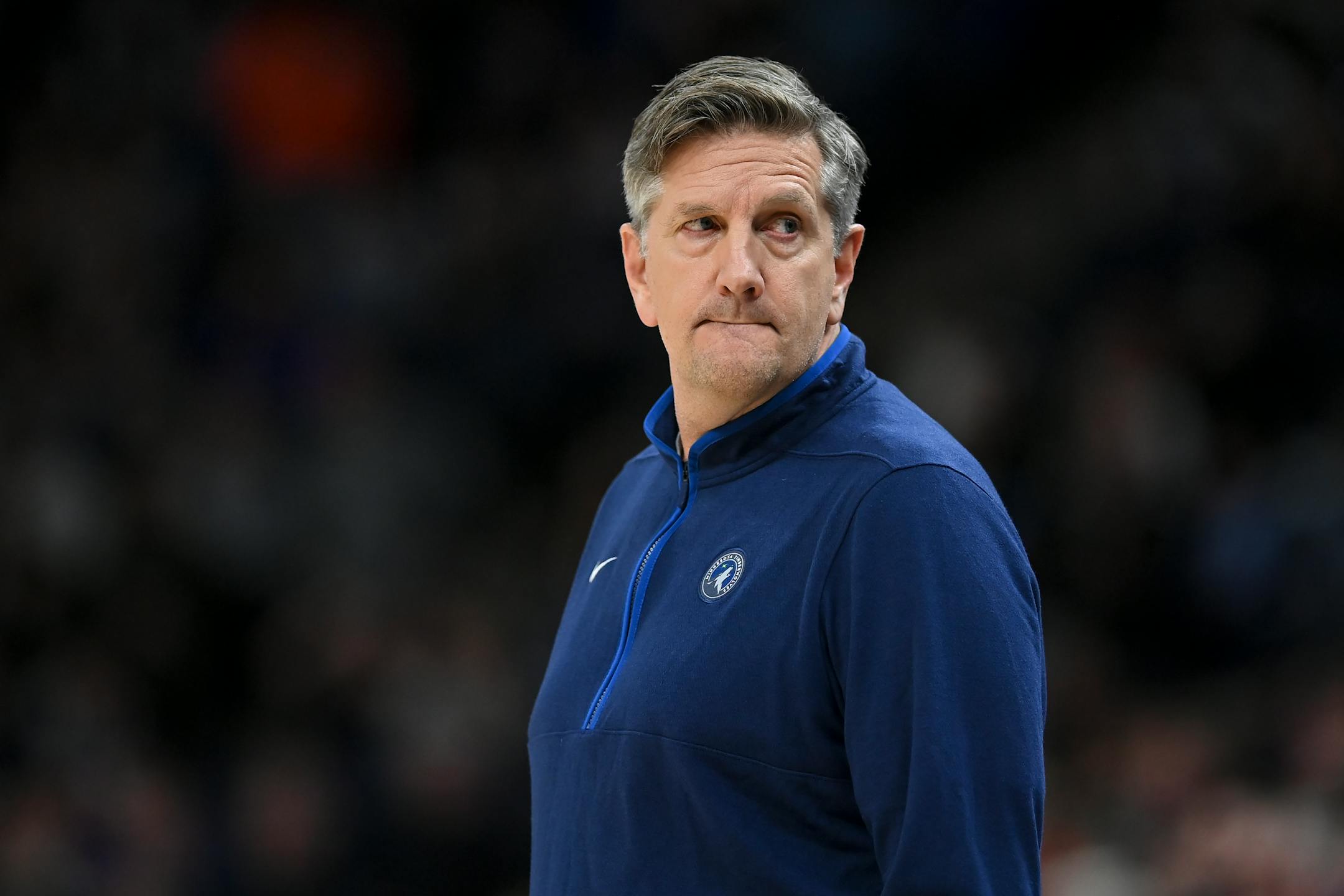 Minnesota Timberwolves head coach Chris Finch looks on after calling a timeout in the fourth quarter.