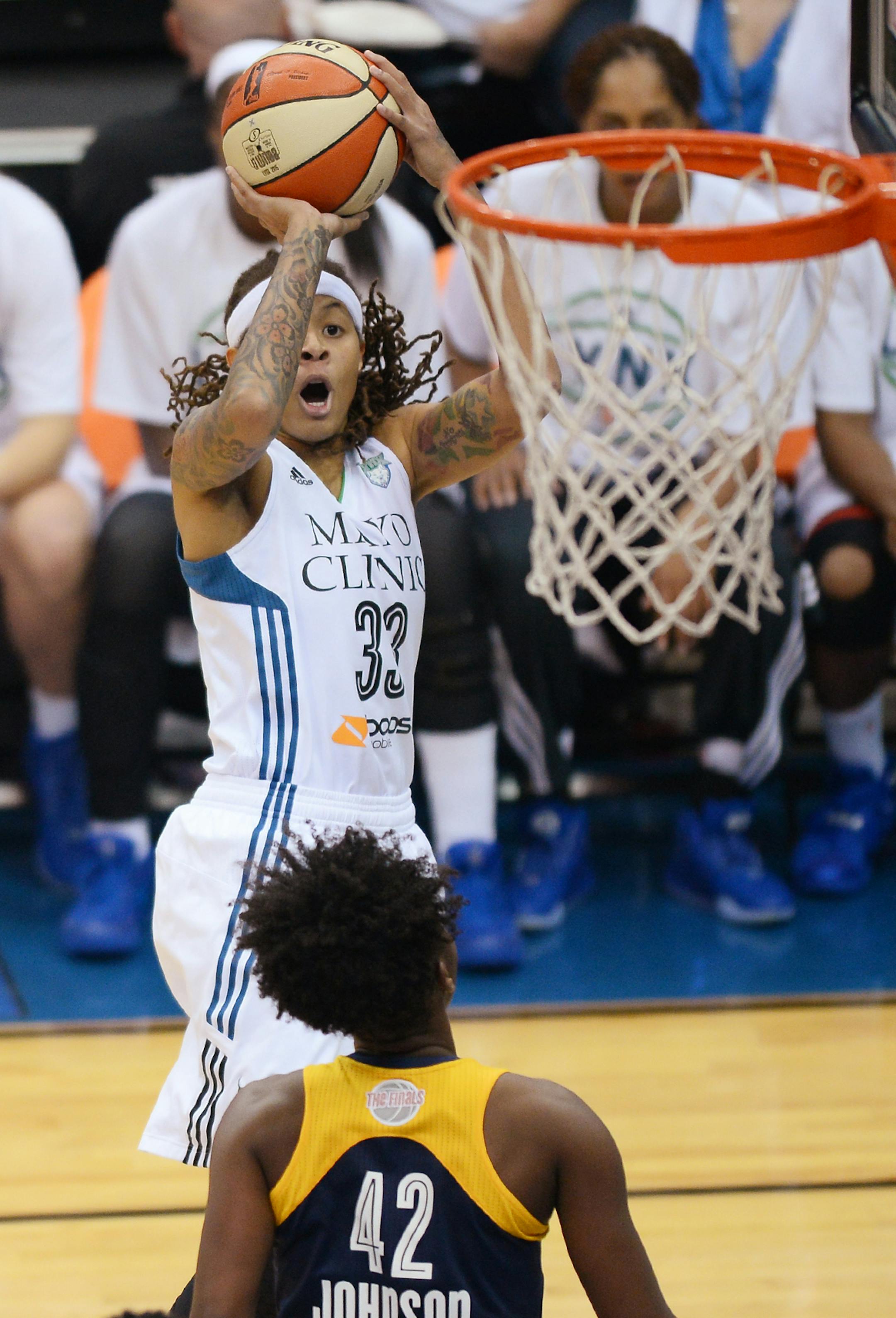 Minnesota Lynx guard Seimone Augustus (33) shoots during the first half.