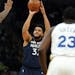 Minnesota Timberwolves center Karl-Anthony Towns (32) went up for a shot in the first half.