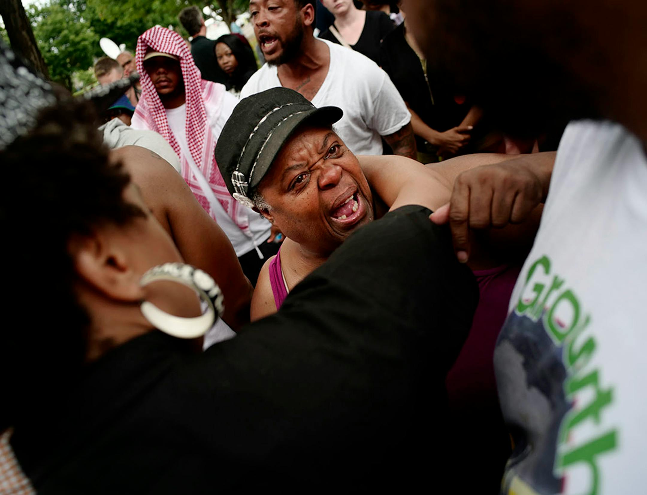 Tensions arose between supporters of Alexander Clark and Nekima Levy-Pound who limited Clark's speech when he spoke.