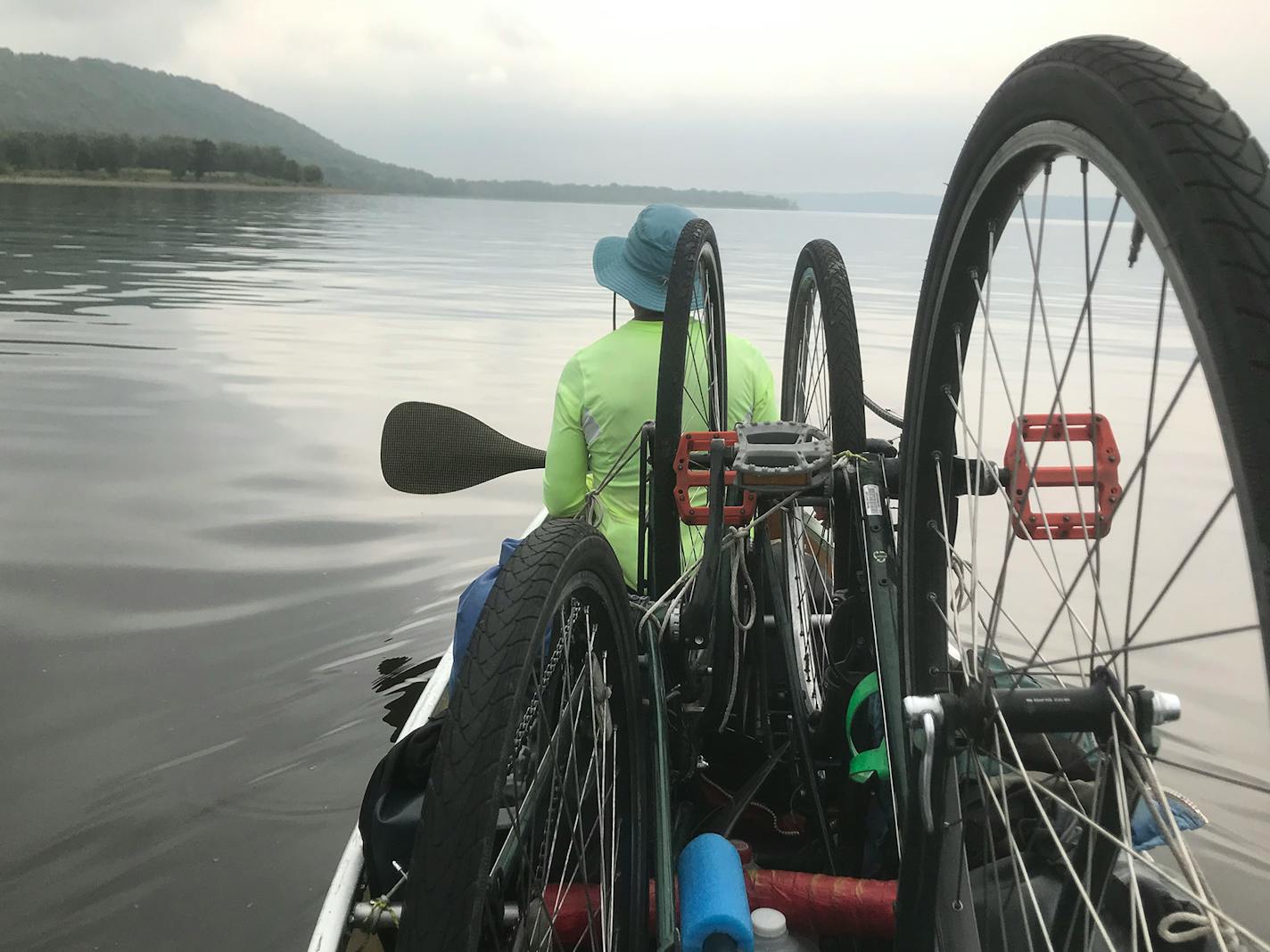 Kathy Mommsen of Minneapolis is canoeing and biking the perimeter of Minnesota with her husband, Tony. Here they paddle the Mississippi River.