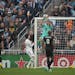 Minnesota United goalkeeper Dayne St. Clair (97) went high for a save in the second half of their game Sunday afternoon, October 9, 2022 at Allianz Fi