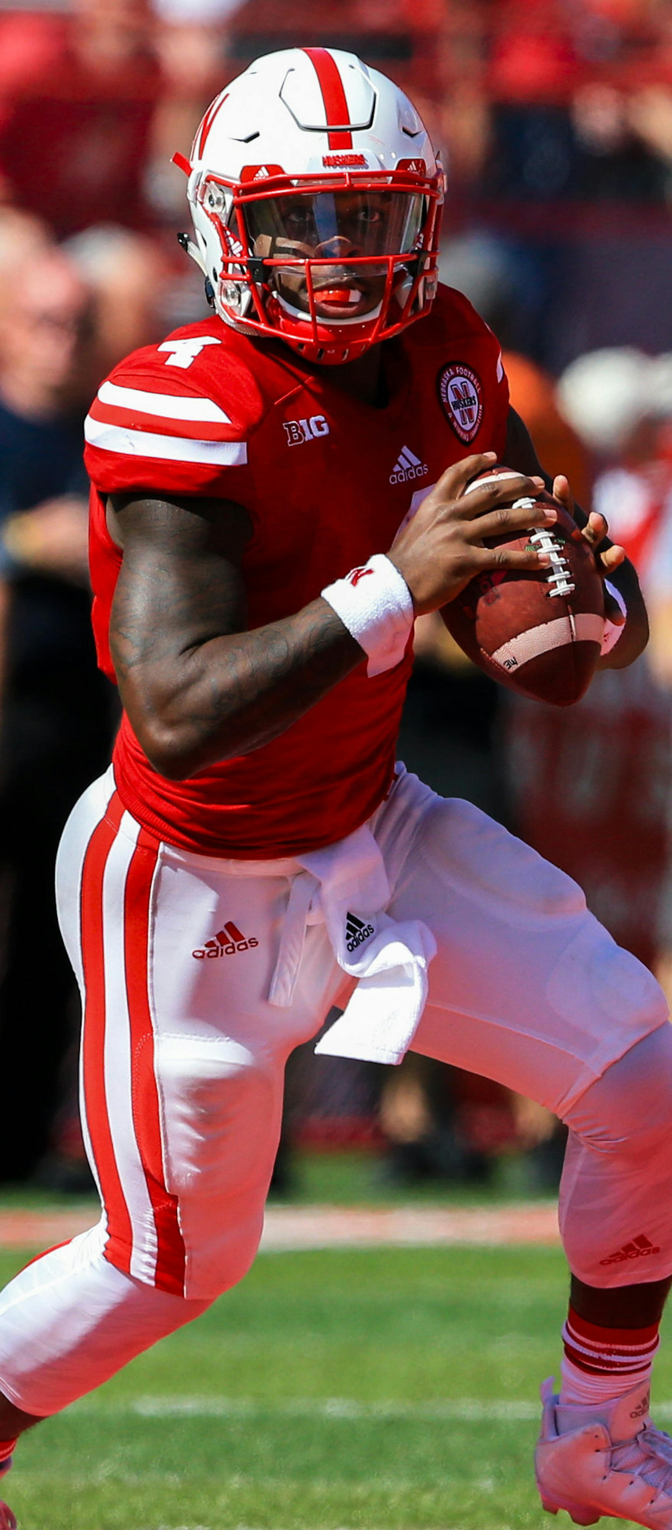 Nebraska quarterback Tommy Armstrong Jr. (4) runs with the ball during the second half of an NCAA college football game against Southern Miss in Lincoln, Neb., Saturday, Sept. 26, 2015. Nebraska won 36-28. (AP Photo/Nati Harnik) ORG XMIT: NENH1