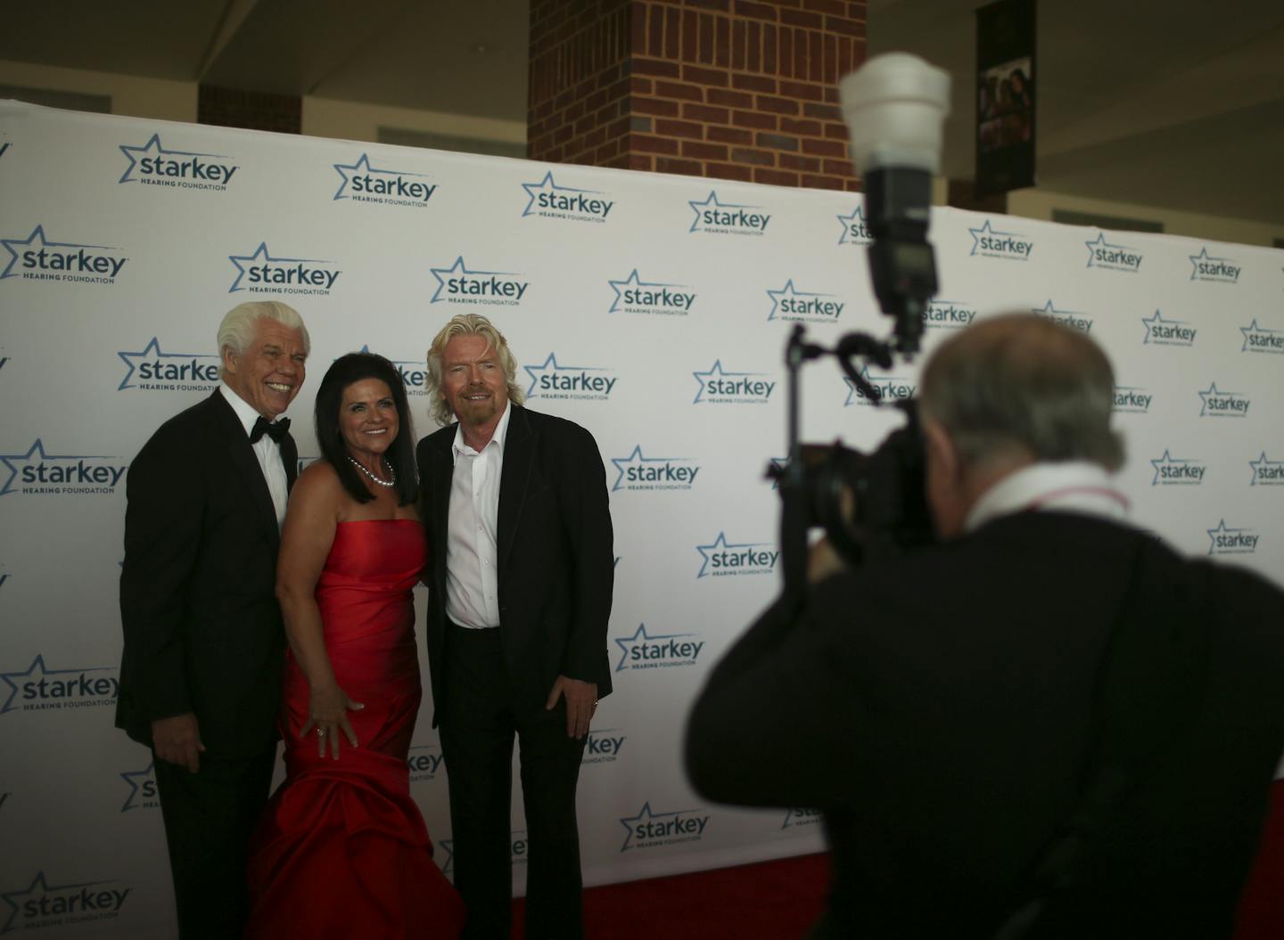 The Starkey Hearing Foundation's 13th Annual So the World May Hear Awards Gala was Sunday evening, July 28, 2013 at Saint Paul RiverCentre in St. Paul. Celebrities from near and far walked the red carpet before attending the gala, which uses the money raised at the event to provide hearing aids to people around the world in need. Sir Richard Branson, right, founder of the Virgin Group, was one of the guests being honored at the gala for his humanitarian efforts. He posed for a photo op with Star