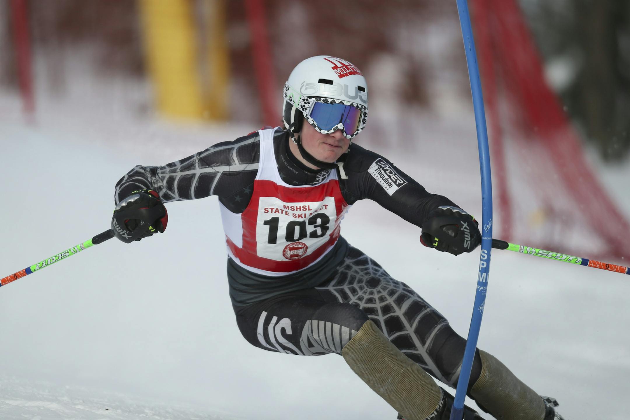 Centennial's Taylor Lindy skis on his way to third place in the the boys' competition in Biwabik, Minn., Wednesday, Feb. 12, 2014. (AP Photo/Star Tribune, Jeff Wheeler) ST. PAUL PIONEER PRESS OUT; SOFT OUT MINNEAPOLIS-AREA TV NOT TV; MAGAZINES OUT