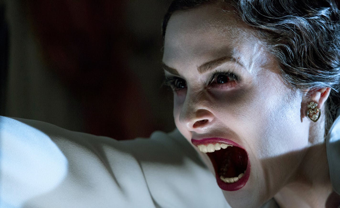 This film image released by FilmDistrict shows Danielle Bisutti in a scene from "Insidious: Chapter 2." (AP Photo/FilmDistrict, Matt Kennedy) ORG XMIT: MIN2013091115241613