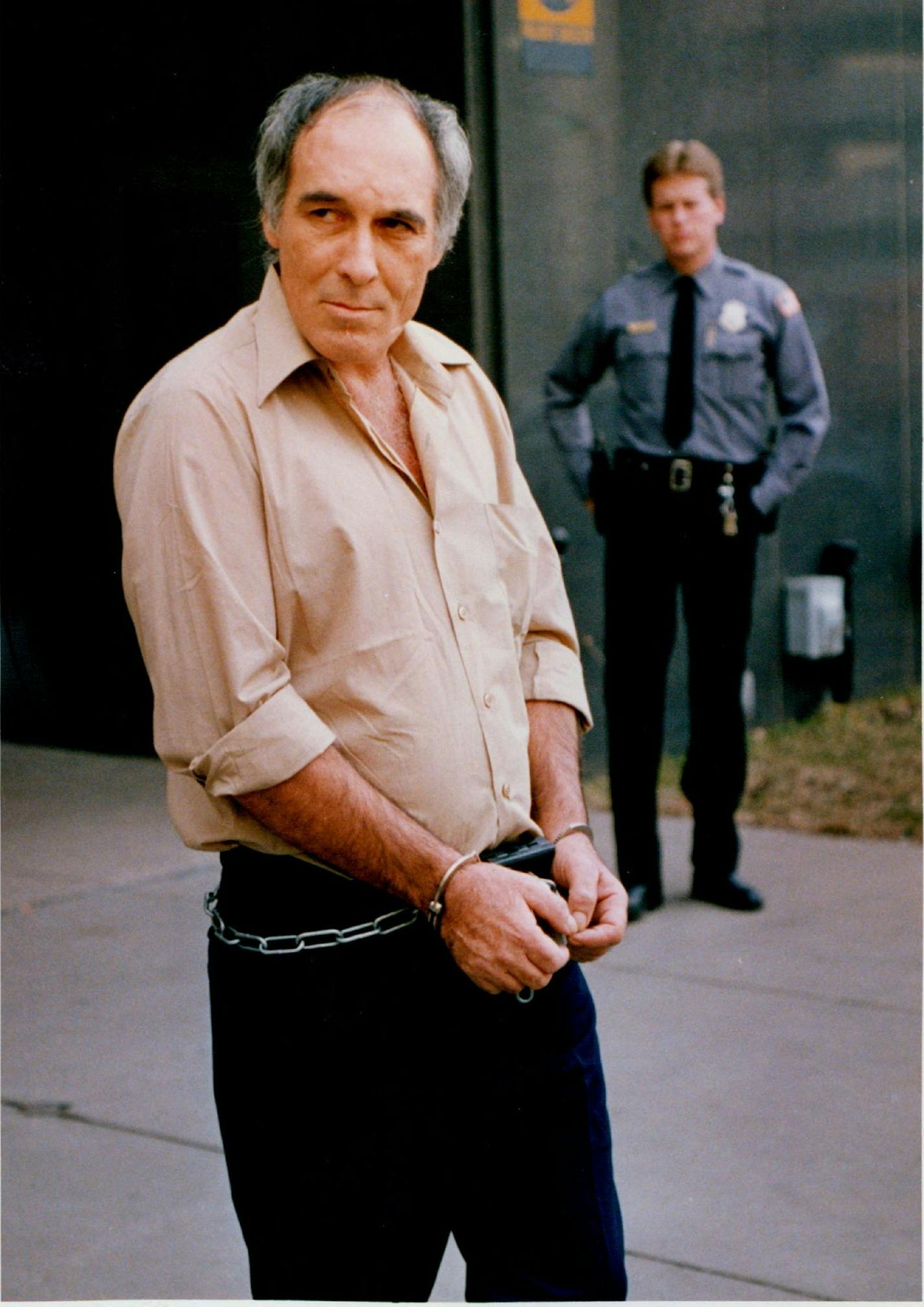 FILE - In this April 1, 1988, file photo, Billy Glaze walks out of the Federal building in Minneapolis. An attorney says Glaze, the drifter convicted of murdering three American Indian women in Minneapolis in the 1980s, died on Tuesday, Dec. 22, 2015. (Bruce Bisping/Star Tribune via AP, File) MANDATORY CREDIT; ST. PAUL PIONEER PRESS OUT; MAGS OUT; TWIN CITIES LOCAL TELEVISION OUT