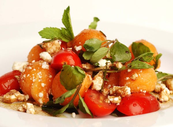 Melon salad with feta and mint makes a refreshing summer side. (Ed Haun/Detroit Free Press/MCT) ORG XMIT: 1155914