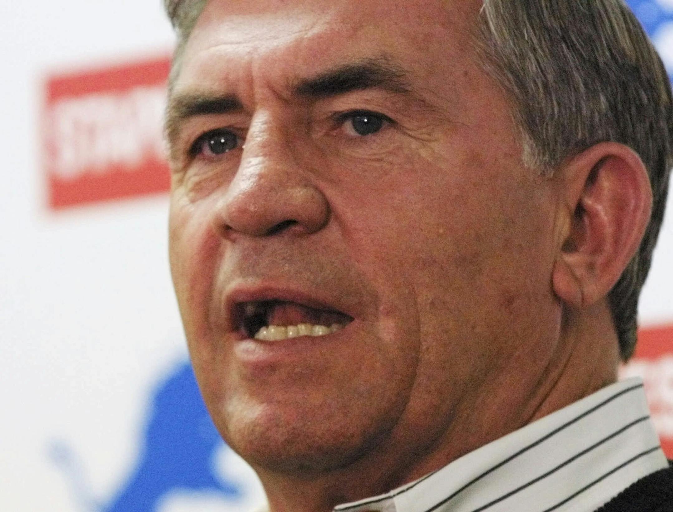 Detroit Lions' Gary Moeller addresses the media during a news conference Monday, Nov. 6, 2000, in Pontiac, Mich. Lions coach Bobby Ross resigned Monday, a day after an embarrassing blowout loss to Miami. Assistant head coach Gary Moeller will take his place and was given a three-year contract. (AP Photo/Duane Burleson)