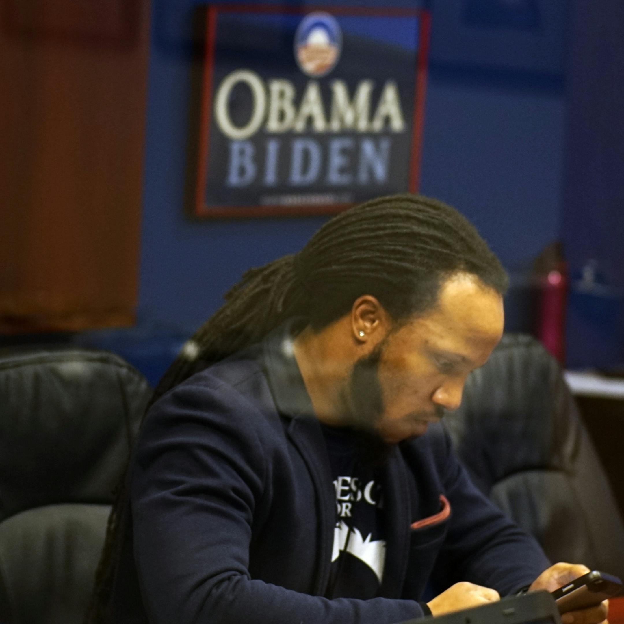 At the DFL headquarters in St. Paul, Tristan Wilkerson, political director for the Bernie Sanders campaign in Minnesota, kept in touch with the campaign on his phone. "We need a government that works for everyone," he said.