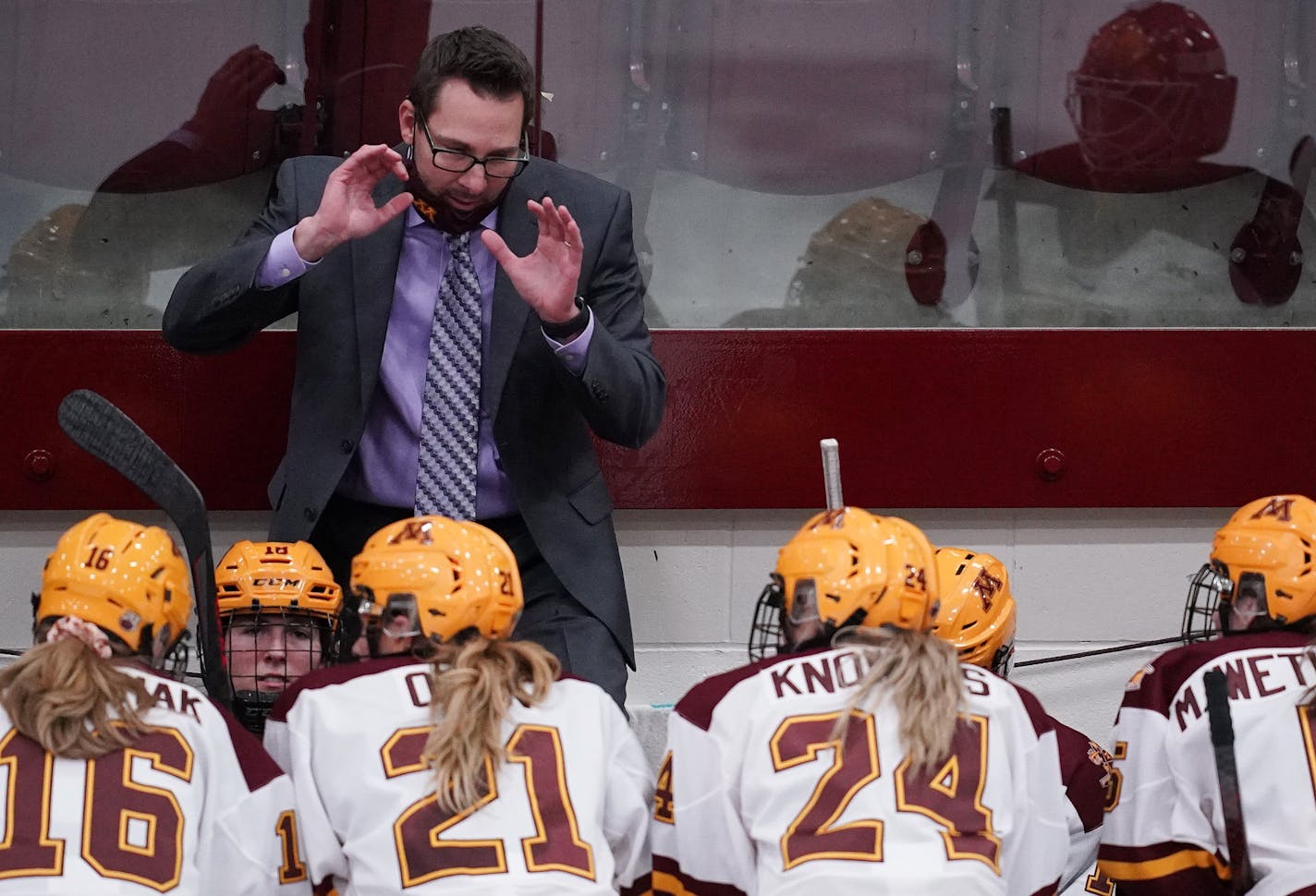 Minnesota head coach Brad Frost talked with his players as they headed into overtime after the third period. ] ANTHONY SOUFFLE • anthony.souffle@startribune.com