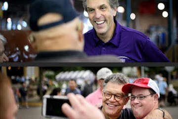 GOP Senate candidate Mike McFadden laughed with Larry and Evy Walters of Brooklyn Park in the State Fair Cattle Barn. Larry Walters then asked if he c