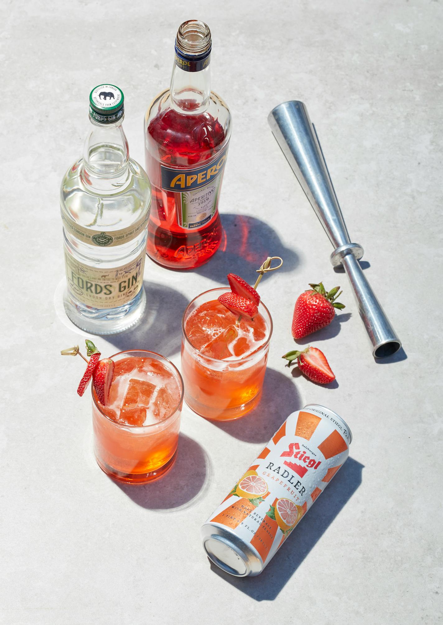 El Chapo combines gin, strawberry-infused aperol and a grapefruit radler. Photo by Dennis Becker, styling by Lisa Golden Schroeder