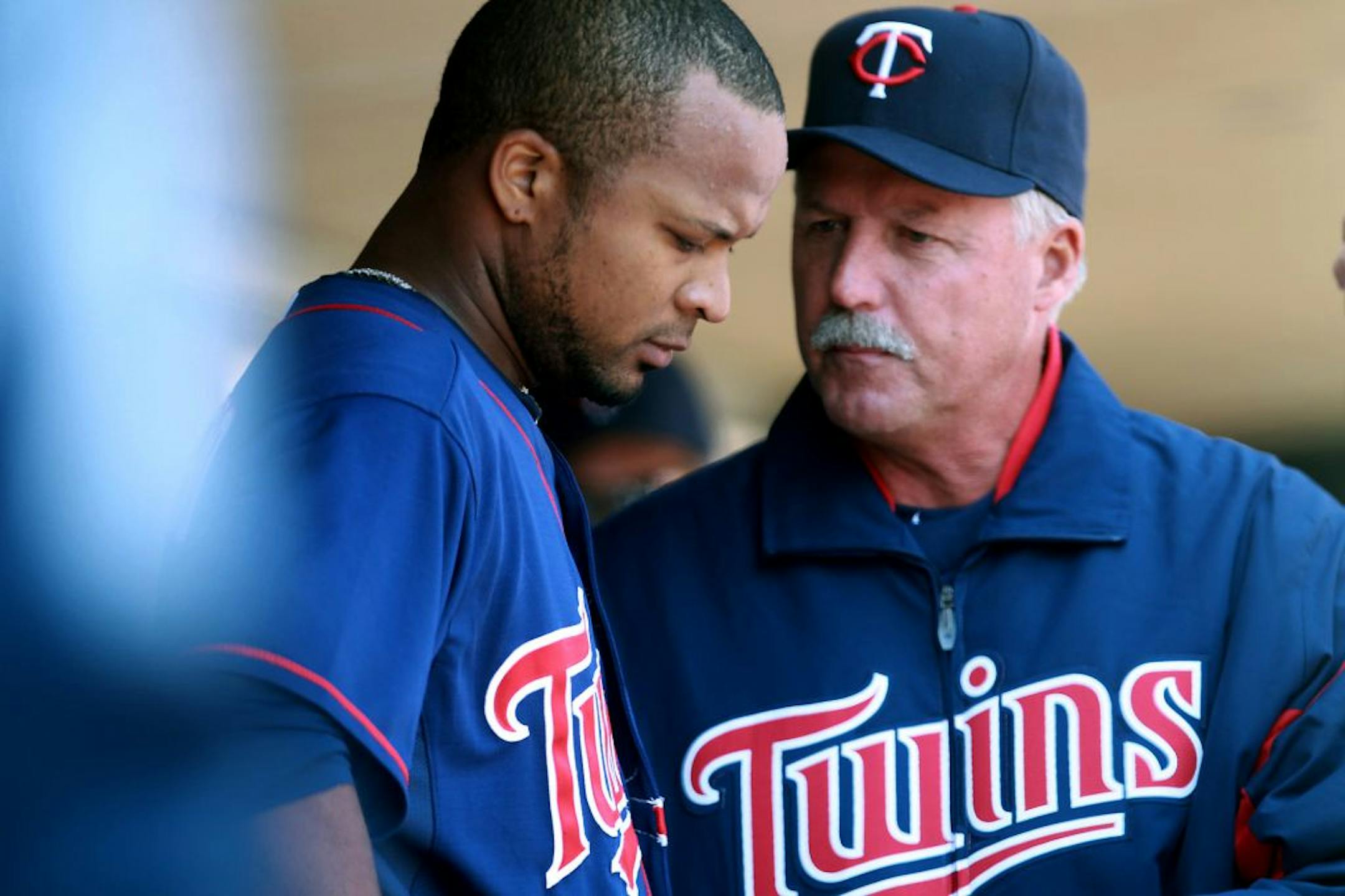Francisco Liriano talked with Twins pitching coach Rick Anderson in the dugout at Target Field.